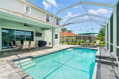This 5 bed, 4.5 bath home sits in a quiet cul-de-sac in the on Royal Tee Country Club in Florida - for sale on GolfHomes.com, golf home, golf lot
