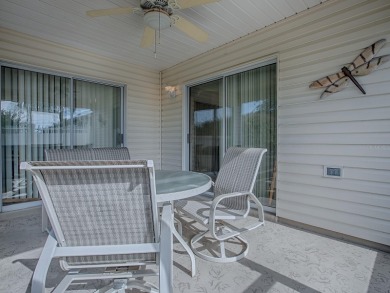 Welcome to your dream home, where comfort meets an active on The Links of Spruce Creek in Florida - for sale on GolfHomes.com, golf home, golf lot