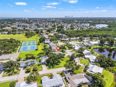 Welcome to 5523 18th St. NE, where elevated living meets on Mangrove Bay Golf Course in Florida - for sale on GolfHomes.com, golf home, golf lot
