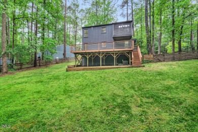 Discover your tranquil retreat in this stylish 3-bedroom on Twin Lakes Golf Course in North Carolina - for sale on GolfHomes.com, golf home, golf lot