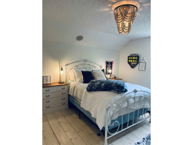 Introducing an exquisite 5-bedroom, 4-bathroom family residence on Timber Ridge Golf Club in Wisconsin - for sale on GolfHomes.com, golf home, golf lot