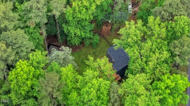 Discover your tranquil retreat in this stylish 3-bedroom on Twin Lakes Golf Course in North Carolina - for sale on GolfHomes.com, golf home, golf lot