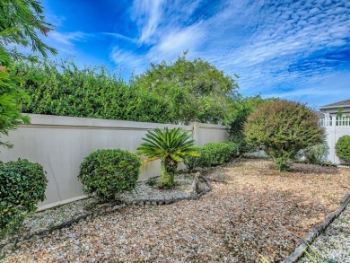 Welcome to your dream home, where comfort meets an active on The Links of Spruce Creek in Florida - for sale on GolfHomes.com, golf home, golf lot