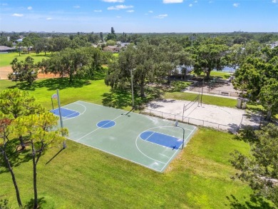 Welcome to 5523 18th St. NE, where elevated living meets on Mangrove Bay Golf Course in Florida - for sale on GolfHomes.com, golf home, golf lot