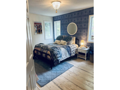 Introducing an exquisite 5-bedroom, 4-bathroom family residence on Timber Ridge Golf Club in Wisconsin - for sale on GolfHomes.com, golf home, golf lot