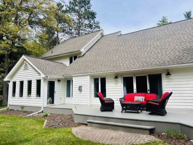 Introducing an exquisite 5-bedroom, 4-bathroom family residence on Timber Ridge Golf Club in Wisconsin - for sale on GolfHomes.com, golf home, golf lot
