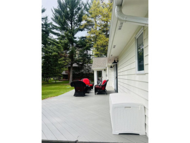 Introducing an exquisite 5-bedroom, 4-bathroom family residence on Timber Ridge Golf Club in Wisconsin - for sale on GolfHomes.com, golf home, golf lot