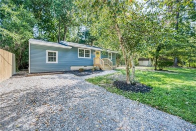 Welcome to 87 Columbine Drive-an updated coastal retreat in the on Piankatank River Golf Club in Virginia - for sale on GolfHomes.com, golf home, golf lot