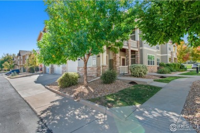 Welcome to this stunning Summer Park end-unit, ground-floor on Boomerang Links in Colorado - for sale on GolfHomes.com, golf home, golf lot