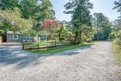 Welcome to 87 Columbine Drive-an updated coastal retreat in the on Piankatank River Golf Club in Virginia - for sale on GolfHomes.com, golf home, golf lot