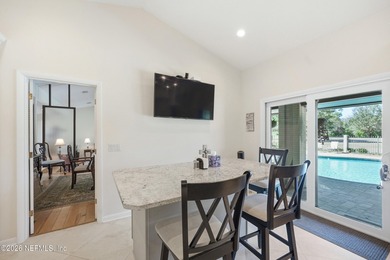 Vaulted ceilings and sunlit interiors define this elegant on The Deerwood Country Club in Florida - for sale on GolfHomes.com, golf home, golf lot