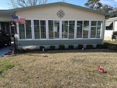 Located in the 55+ community of Rolling Greens Village, this two on Rolling Greens Executive Golf Community in Florida - for sale on GolfHomes.com, golf home, golf lot