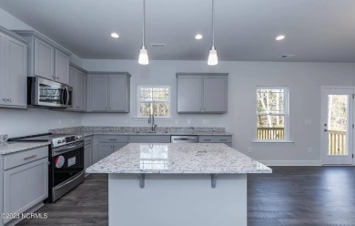 Welcome to 1430 Mona Passage Court, a delightful two-story home on Harbour Point Golf Club in North Carolina - for sale on GolfHomes.com, golf home, golf lot
