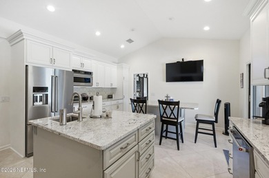 Vaulted ceilings and sunlit interiors define this elegant on The Deerwood Country Club in Florida - for sale on GolfHomes.com, golf home, golf lot