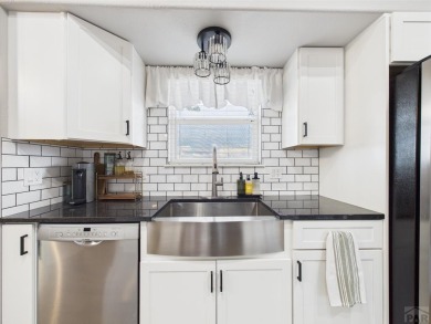 Experience luxury and comfort in this beautiful 2-story home on Desert Hawk At Pueblo West in Colorado - for sale on GolfHomes.com, golf home, golf lot