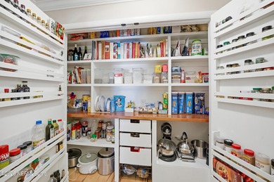 Vaulted ceilings and sunlit interiors define this elegant on The Deerwood Country Club in Florida - for sale on GolfHomes.com, golf home, golf lot