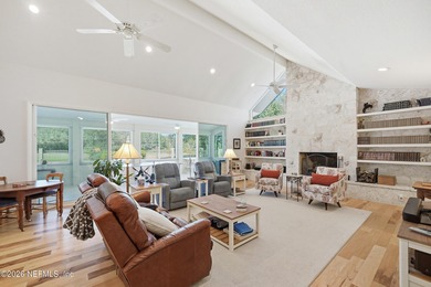 Vaulted ceilings and sunlit interiors define this elegant on The Deerwood Country Club in Florida - for sale on GolfHomes.com, golf home, golf lot