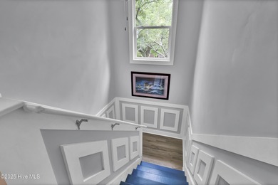 Discover the perfect island retreat in this charming coastal on Bald Head Island Golf Club in North Carolina - for sale on GolfHomes.com, golf home, golf lot