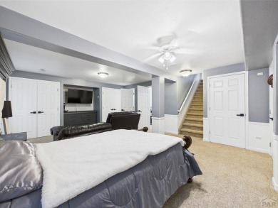 Experience luxury and comfort in this beautiful 2-story home on Desert Hawk At Pueblo West in Colorado - for sale on GolfHomes.com, golf home, golf lot
