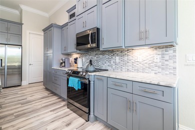 Just five years young, this home has been gently lived in and on Rotonda Golf and Country Club - Long Marsh  in Florida - for sale on GolfHomes.com, golf home, golf lot