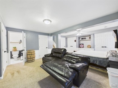 Experience luxury and comfort in this beautiful 2-story home on Desert Hawk At Pueblo West in Colorado - for sale on GolfHomes.com, golf home, golf lot