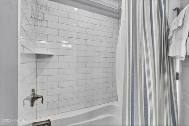 Discover the perfect island retreat in this charming coastal on Bald Head Island Golf Club in North Carolina - for sale on GolfHomes.com, golf home, golf lot