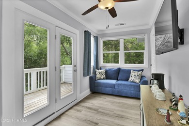 Discover the perfect island retreat in this charming coastal on Bald Head Island Golf Club in North Carolina - for sale on GolfHomes.com, golf home, golf lot