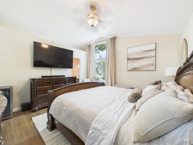 Experience luxury and comfort in this beautiful 2-story home on Desert Hawk At Pueblo West in Colorado - for sale on GolfHomes.com, golf home, golf lot