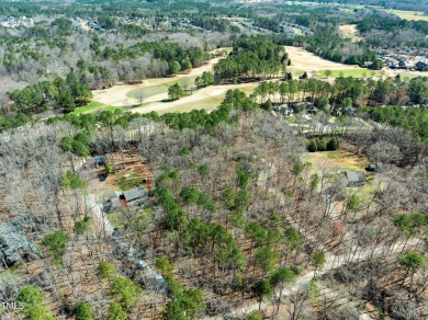 Private and secluded compound property situated on over 2 acres on Hasentree Club in North Carolina - for sale on GolfHomes.com, golf home, golf lot