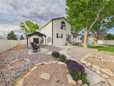 Experience luxury and comfort in this beautiful 2-story home on Desert Hawk At Pueblo West in Colorado - for sale on GolfHomes.com, golf home, golf lot