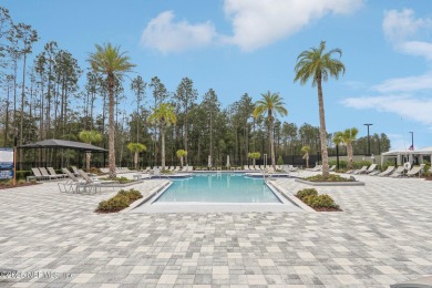 Experience modern living in this 2023-built 2-bedroom, 2-bath on Cimarrone Golf and Country Club in Florida - for sale on GolfHomes.com, golf home, golf lot