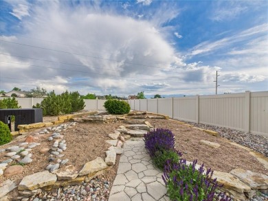 Experience luxury and comfort in this beautiful 2-story home on Desert Hawk At Pueblo West in Colorado - for sale on GolfHomes.com, golf home, golf lot