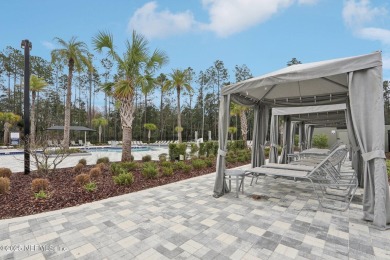 Experience modern living in this 2023-built 2-bedroom, 2-bath on Cimarrone Golf and Country Club in Florida - for sale on GolfHomes.com, golf home, golf lot