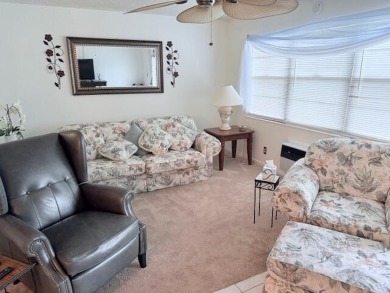 Lovely furnished 1 bedroom 1.5 bath unit in quiet location near on Hillsboro Pines Golf in Florida - for sale on GolfHomes.com, golf home, golf lot