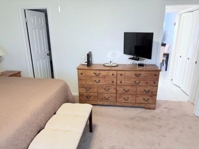 Lovely furnished 1 bedroom 1.5 bath unit in quiet location near on Hillsboro Pines Golf in Florida - for sale on GolfHomes.com, golf home, golf lot