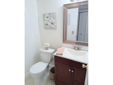 Lovely furnished 1 bedroom 1.5 bath unit in quiet location near on Hillsboro Pines Golf in Florida - for sale on GolfHomes.com, golf home, golf lot