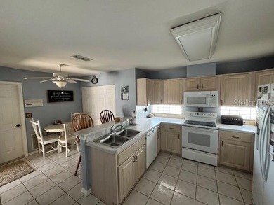 Beautiful  3-bedroom, 2-bath concrete block home (built 1996) on Royal Oaks Golf Club in Florida - for sale on GolfHomes.com, golf home, golf lot