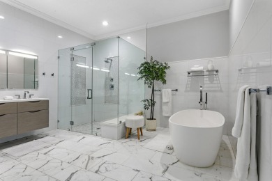 Stunning 5BD/3.1BA coastal contemporary home in exclusive on Seminole Golf Club in Florida - for sale on GolfHomes.com, golf home, golf lot