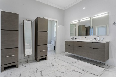 Stunning 5BD/3.1BA coastal contemporary home in exclusive on Seminole Golf Club in Florida - for sale on GolfHomes.com, golf home, golf lot