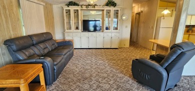 Furnished, spacious 2 bedroom 2 bath home in 55 + Resort style on Zephyrhills Municipal Golf Course in Florida - for sale on GolfHomes.com, golf home, golf lot