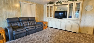 Furnished, spacious 2 bedroom 2 bath home in 55 + Resort style on Zephyrhills Municipal Golf Course in Florida - for sale on GolfHomes.com, golf home, golf lot