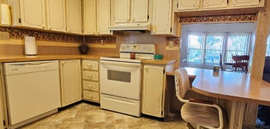 Furnished, spacious 2 bedroom 2 bath home in 55 + Resort style on Zephyrhills Municipal Golf Course in Florida - for sale on GolfHomes.com, golf home, golf lot