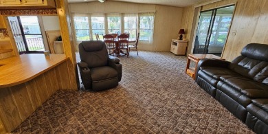 Furnished, spacious 2 bedroom 2 bath home in 55 + Resort style on Zephyrhills Municipal Golf Course in Florida - for sale on GolfHomes.com, golf home, golf lot