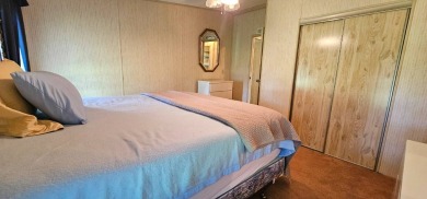Furnished, spacious 2 bedroom 2 bath home in 55 + Resort style on Zephyrhills Municipal Golf Course in Florida - for sale on GolfHomes.com, golf home, golf lot