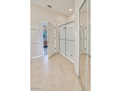 Offering spectacular Country Club living at it's finest in this on Colonial Country Club in Florida - for sale on GolfHomes.com, golf home, golf lot
