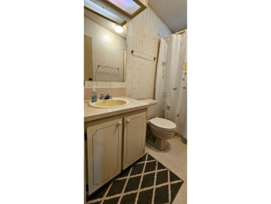 Furnished, spacious 2 bedroom 2 bath home in 55 + Resort style on Zephyrhills Municipal Golf Course in Florida - for sale on GolfHomes.com, golf home, golf lot