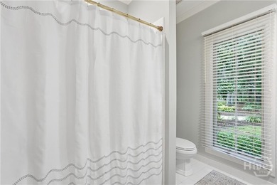 Immaculately maintained and beautifully appointed, this luxury on The Landings Club - Oakridge in Georgia - for sale on GolfHomes.com, golf home, golf lot