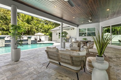 Stunning 5BD/3.1BA coastal contemporary home in exclusive on Seminole Golf Club in Florida - for sale on GolfHomes.com, golf home, golf lot