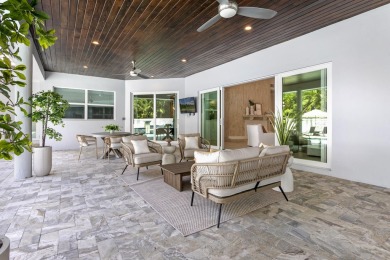 Stunning 5BD/3.1BA coastal contemporary home in exclusive on Seminole Golf Club in Florida - for sale on GolfHomes.com, golf home, golf lot