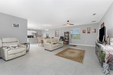 Impressive and spacious 4 Bedroom, 2 Bathroom home with attached on Deep Creek Golf Club in Florida - for sale on GolfHomes.com, golf home, golf lot